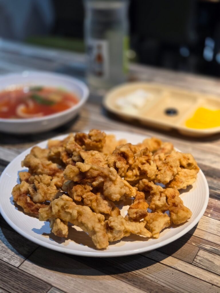 Korean tangsuyuk fried pork served with sweet and sour sauce